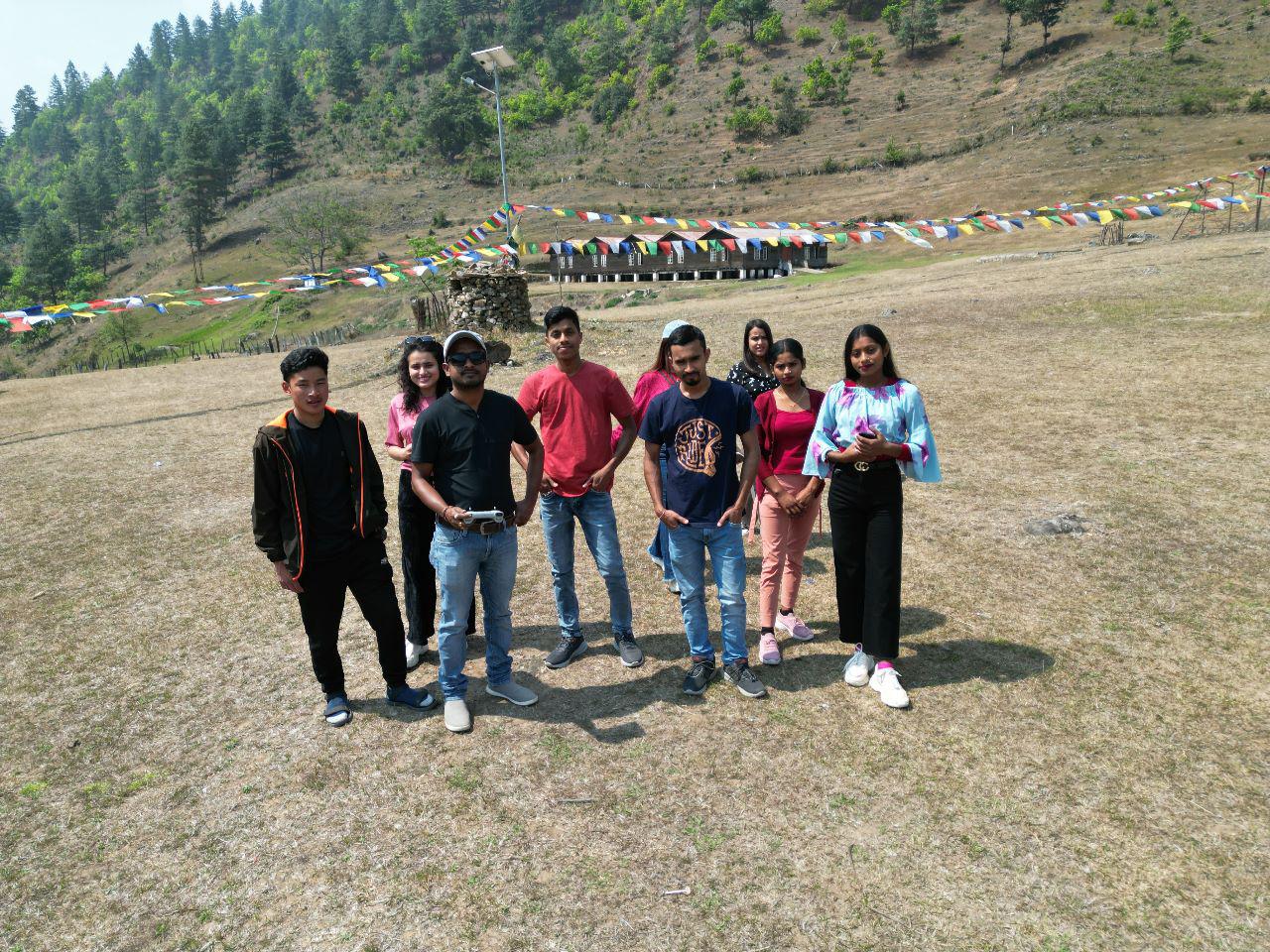 Tourist group smiling on a scenic Tawang trip